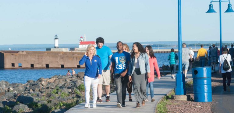 St. Scholastica students walking on the Lakewalk in Canal Park, Duluth, MN.